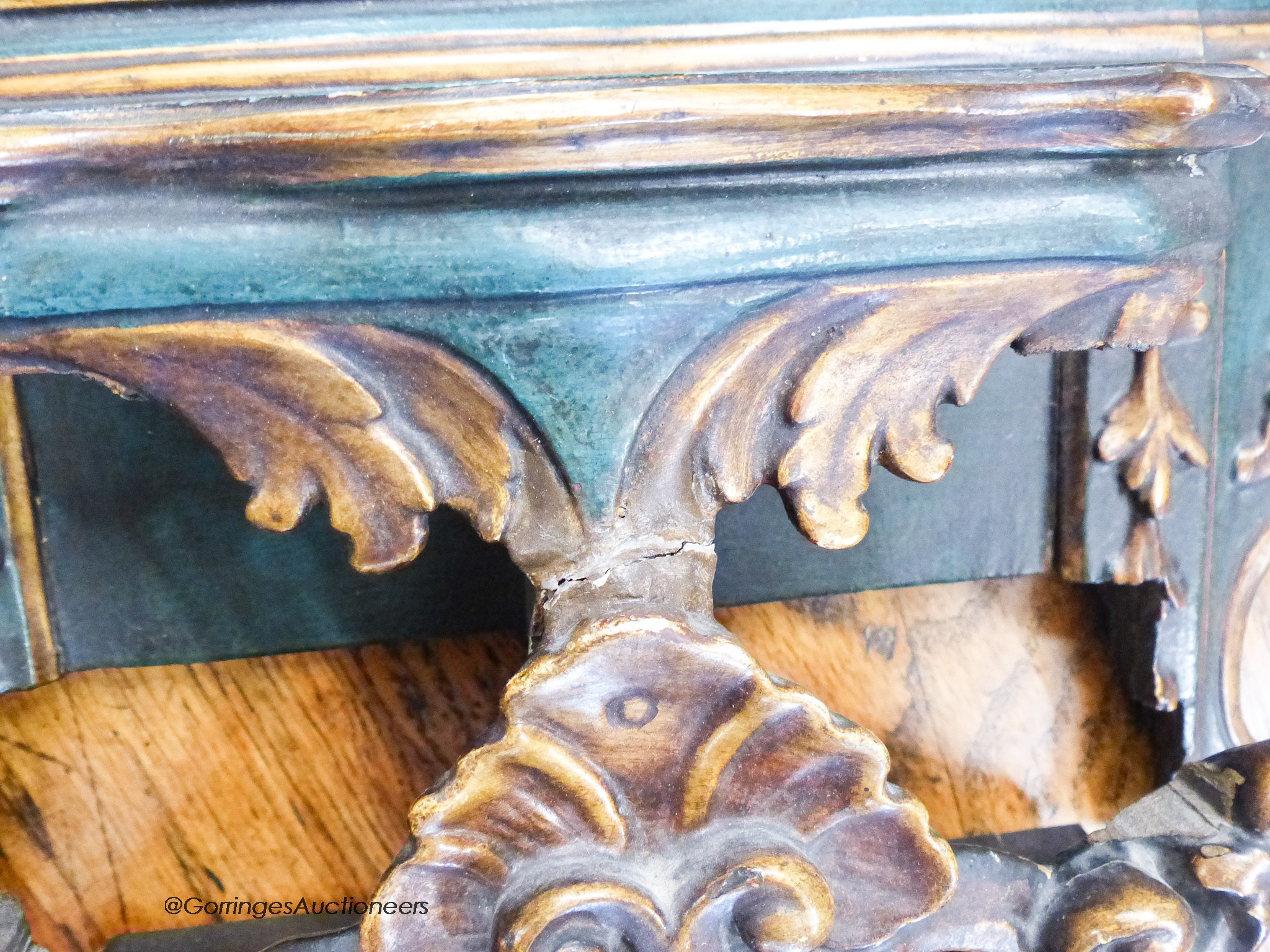 An Iberian green-painted and parcel-gilt rectangular wall mirror